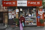 India turns to corner shops, mobile phones for banking revolution