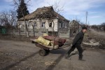Ruins and recriminations after rebel advance on two east Ukrainian towns
