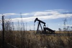 Brent tumbles on Iran, Libya; U.S. crude up on spread play