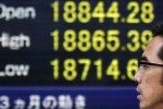 Asian shares firm as U.S. stocks hit records; RBA in focus