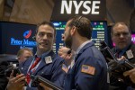 Wall Street falls as strong jobs data may bring rate hike sooner