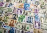 Dollar softens but holds near multi-year highs ahead of U.S. data