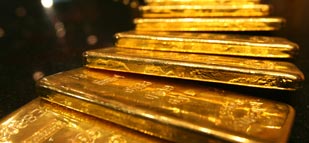 Gold prices ease in Asia on continued reaction to Fed taper