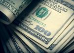 Dollar slips lower vs. other majors with U.S. data, Fed meeting on tap