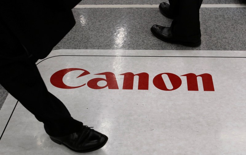 Weaker yen helps to lift Canon profit as camera demand slows