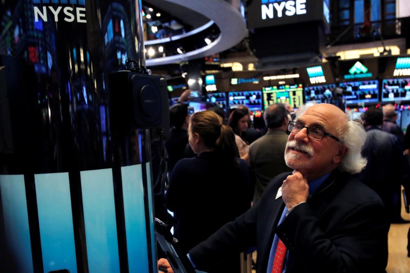 © Reuters. A trader works on the floor at the New York Stock Exchange (NYSE) in Manhattan, New York City, U.S.