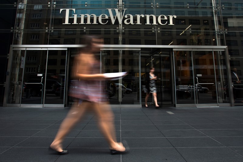 © Reuters. A woman walks past the Time Warner Center near Columbus Circle in Manhattan, New York