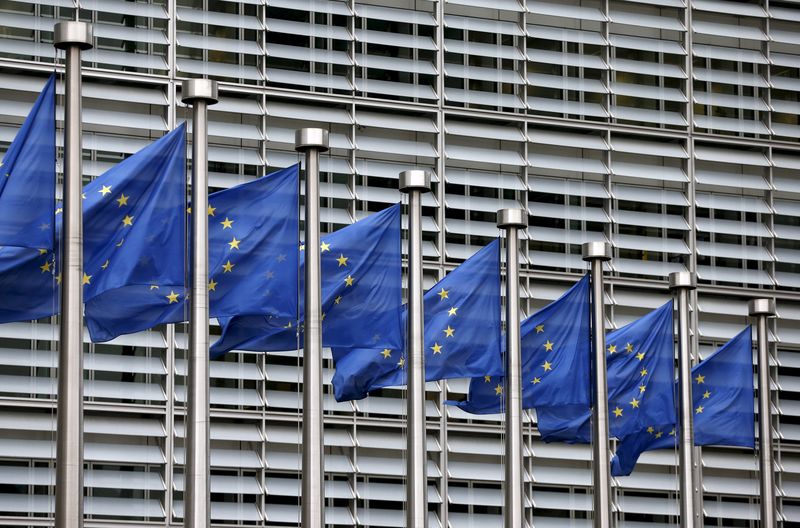 © Reuters. File picture shows European Union flags fluttering outside the EU Commission headquarters in Brussels