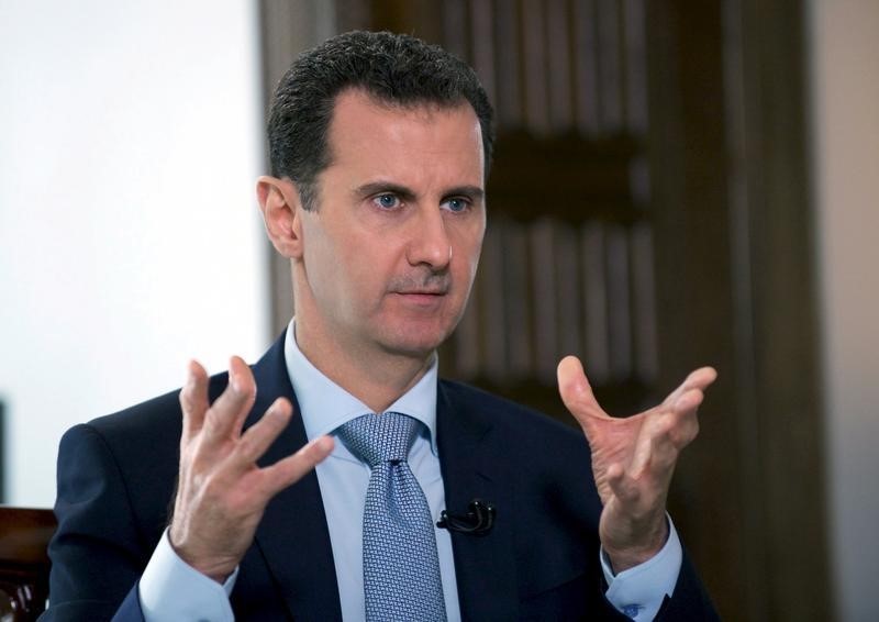 ロイター©。 ロシアのRIA新しい代理店とのインタビューの中で話すシリアの大統領アサドのファイルの写真